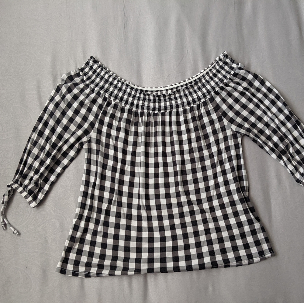 Off the shoulder black and white shirt